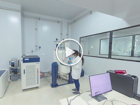 Virtual tour: Aragen analyst beside an Avance NEO NMR spectrometer in the analytical chemistry lab (video)