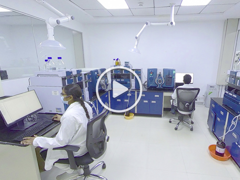 Virtual tour: Aragen scientist at a workstation in the DMPK laboratory with LC-MS instruments (video)