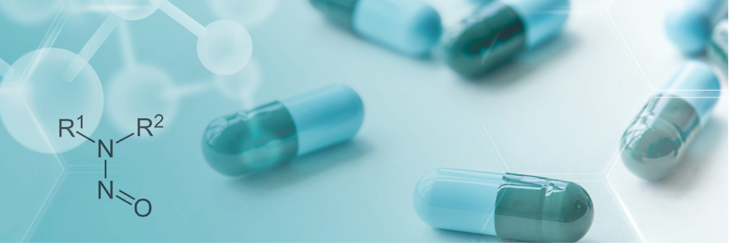 Nitrosamine chemical structure (R1-N(R2)-N=O) overlaid on blue-green pharmaceutical capsules