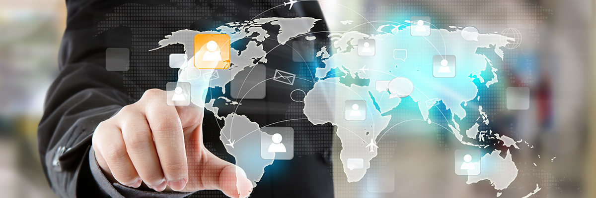 Businessperson touching a digital world map with supply-chain and logistics icons