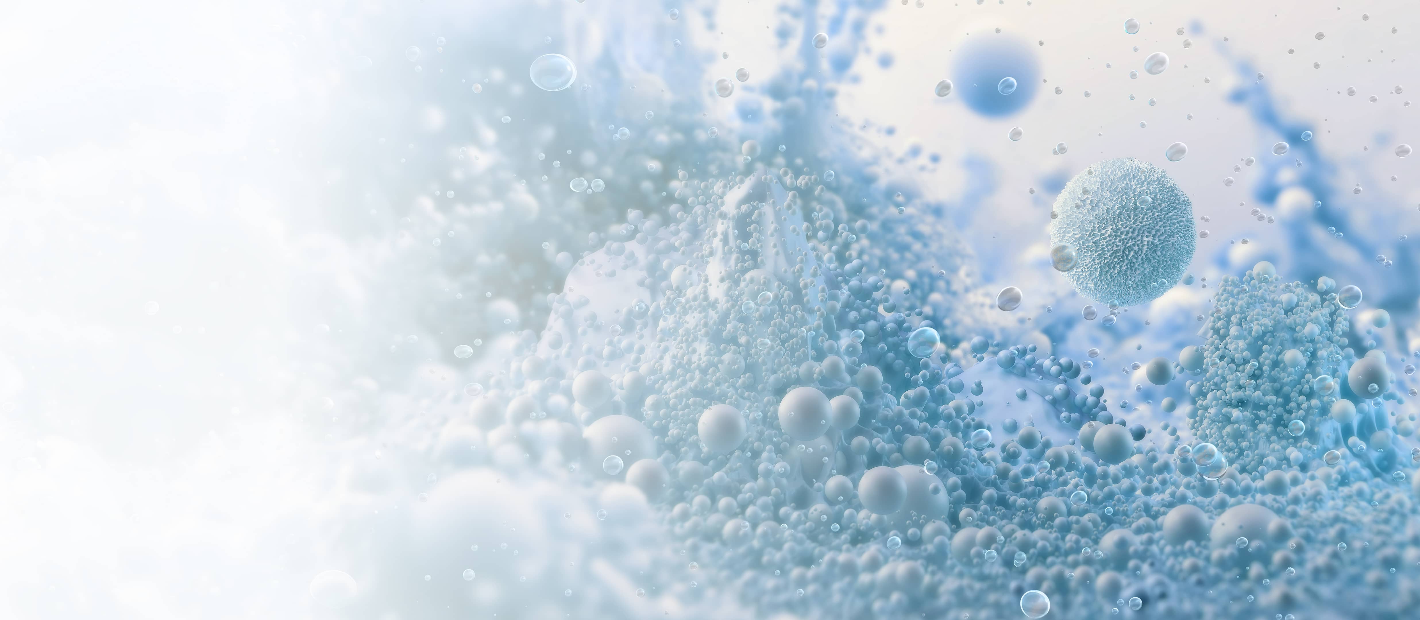 Close-up of blue-white crystallizing particles and bubbles, representing in-line PAT crystallization control